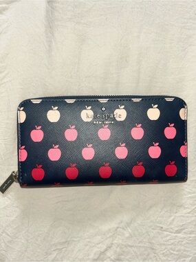 kate spade navy zip-around wallet with pink & red apple print